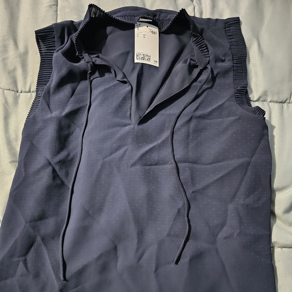 Sleeveless tie neck blouse